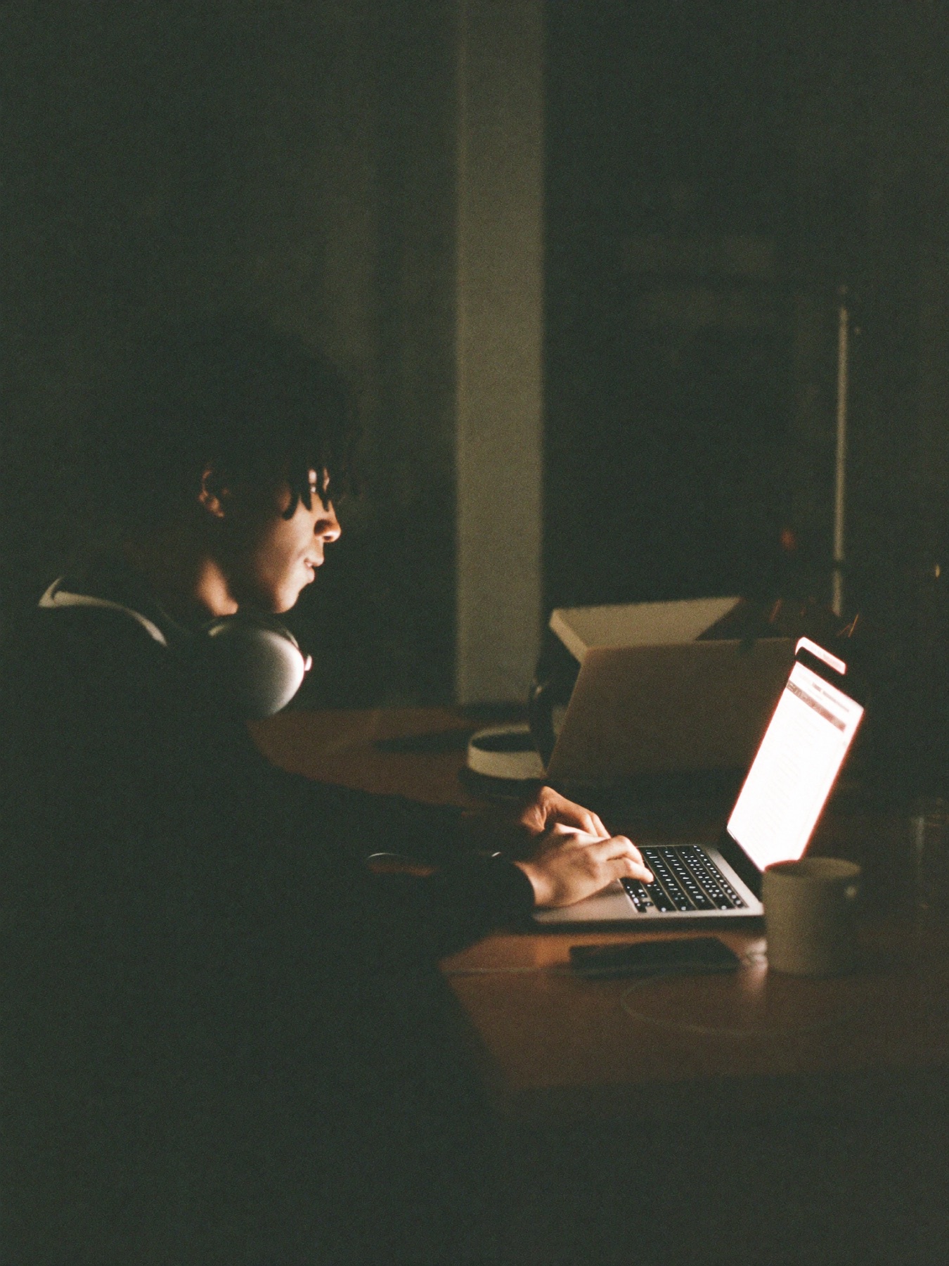 An engineer working late at his desk